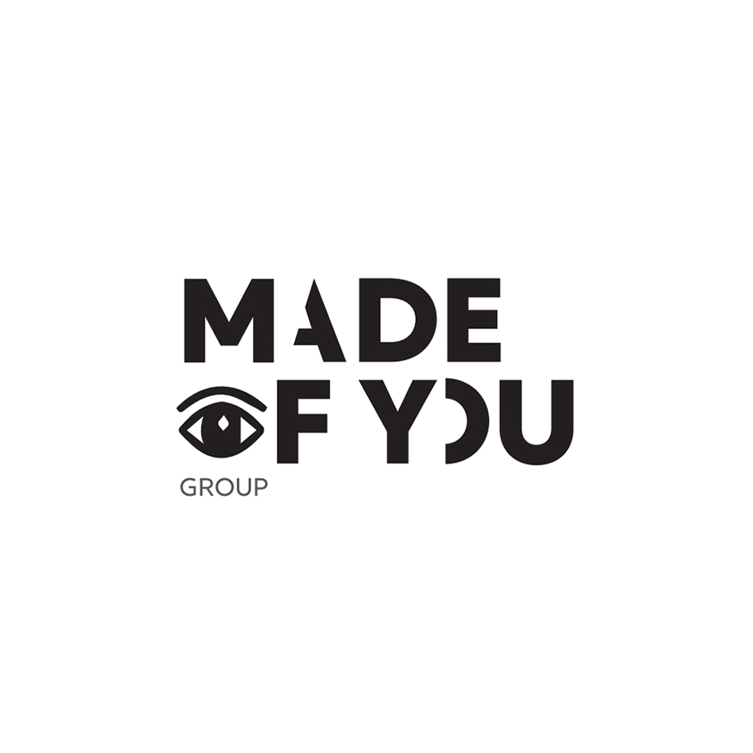 "Made of You Group" logo with stylized eye design.