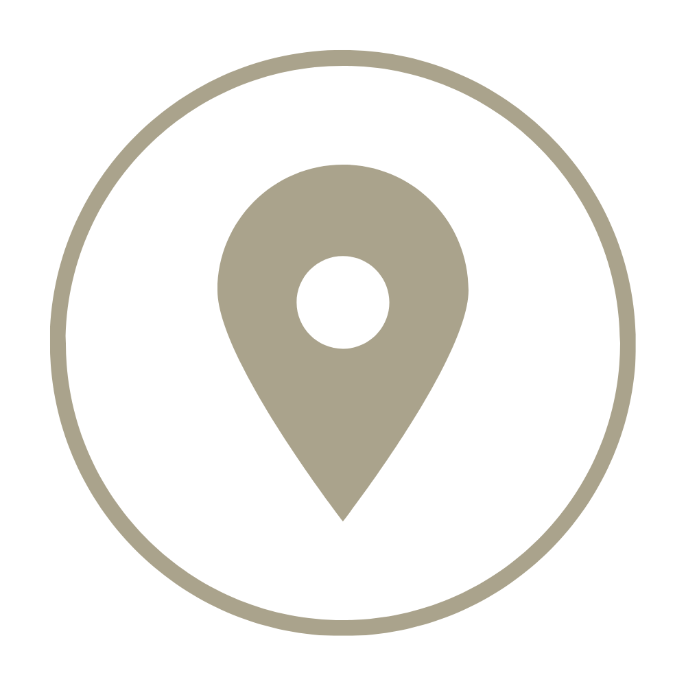 A map location pin icon inside a black circle.