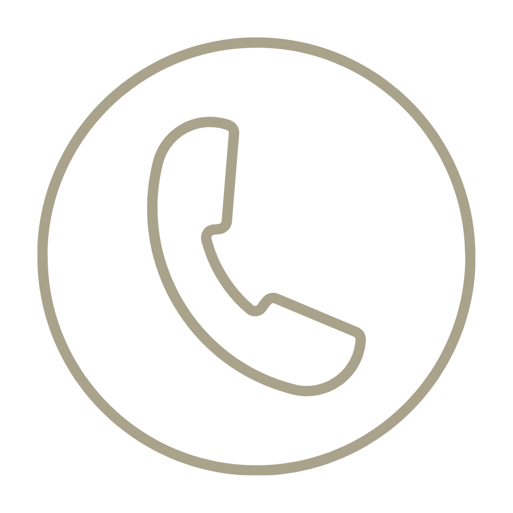 Icon of a telephone handset inside a circle, representing a phone call.