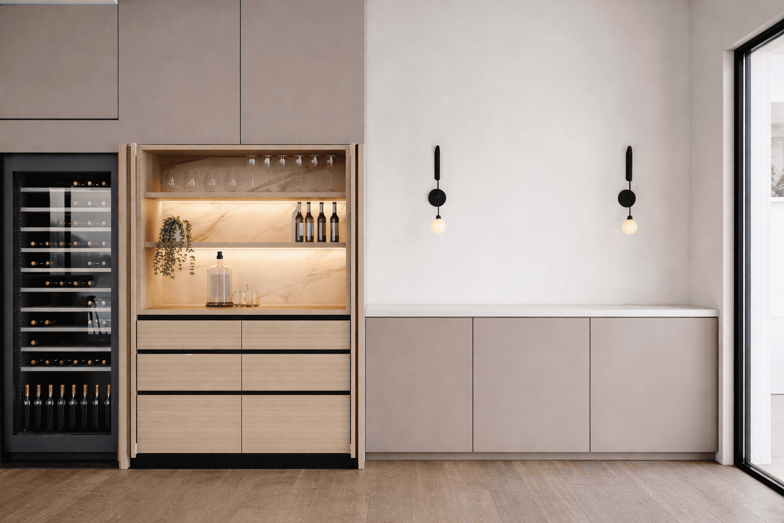 Modern home bar with warm lighting.png