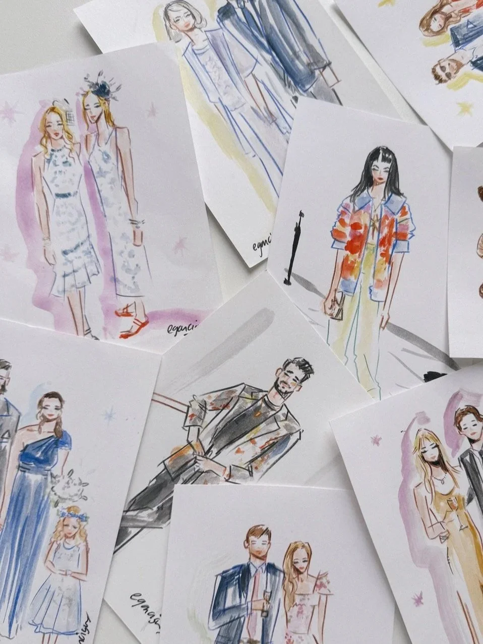 Collection of fashion illustrations depicting men and women in various stylish outfits by Eduard Illustrates