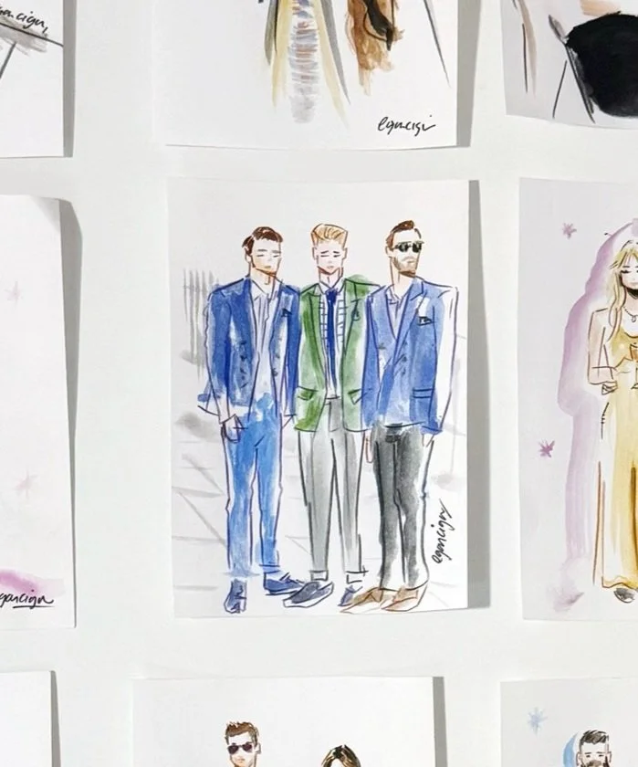 Watercolor illustration of three men in suits standing outdoors. They are dressed stylishly, with the man in the middle wearing a green jacket, the man on the left in a blue suit, and the man on the right in a blue suit with sunglasses.