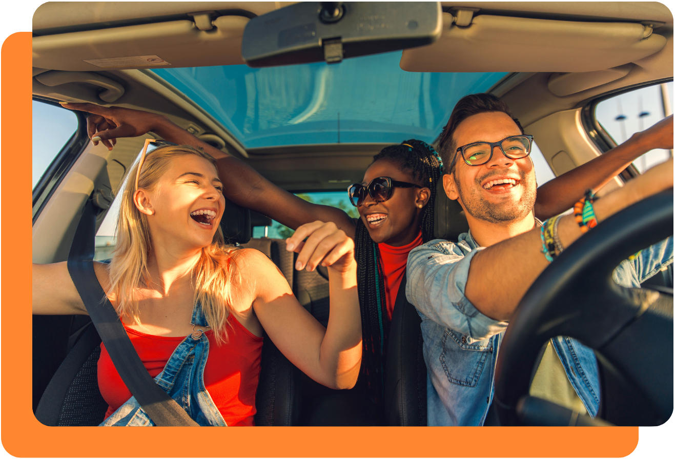 Friends enjoying road trip in car