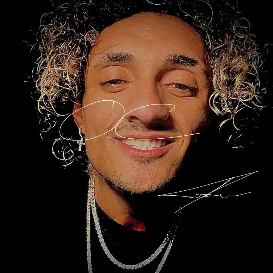 Close-up photo of a smiling person with curly hair wearing a necklace and earring, with digital signature overlays.
