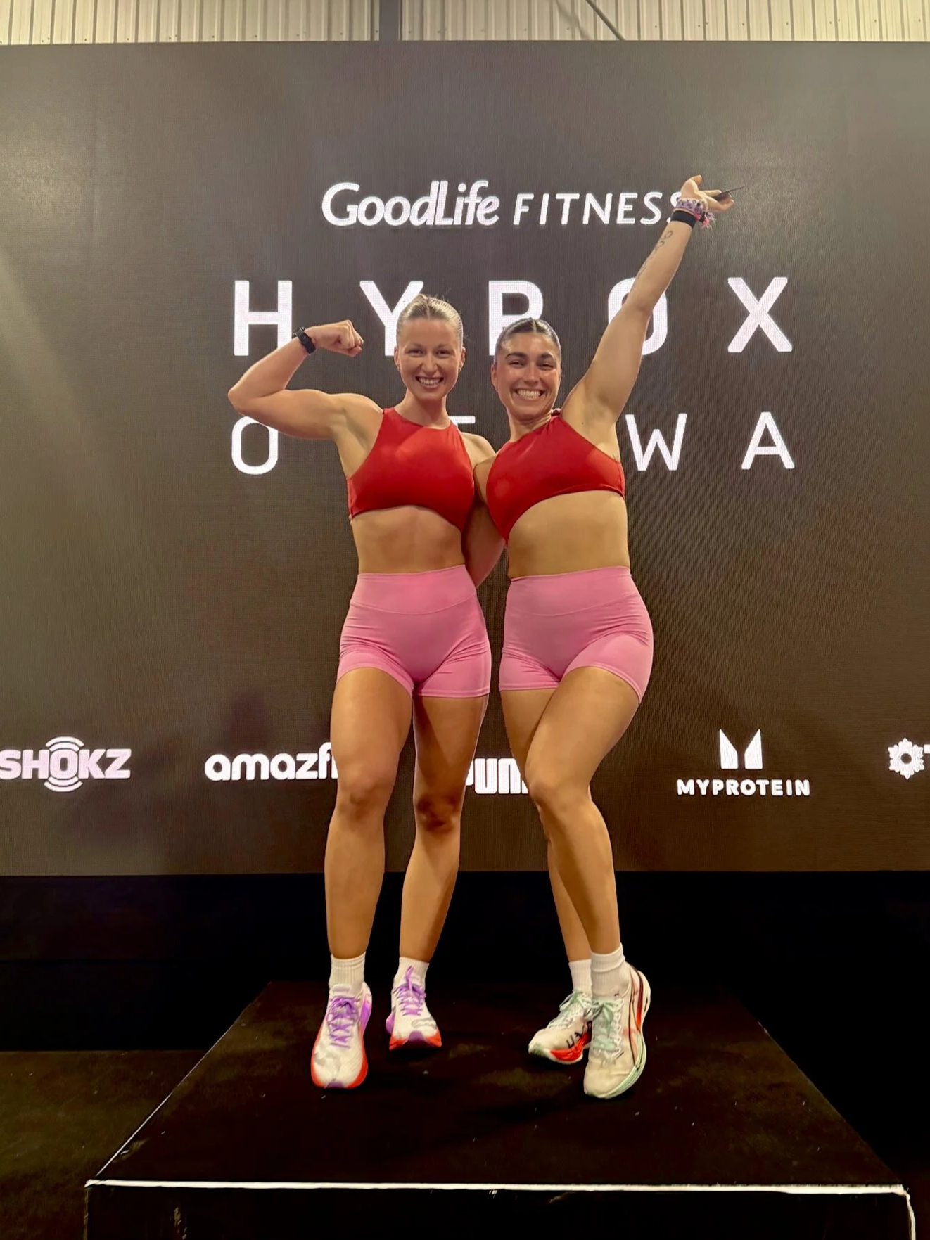 Two women post Hyrox Race who Trained in Parry Sound at Anytime Fitness with Fitbmich