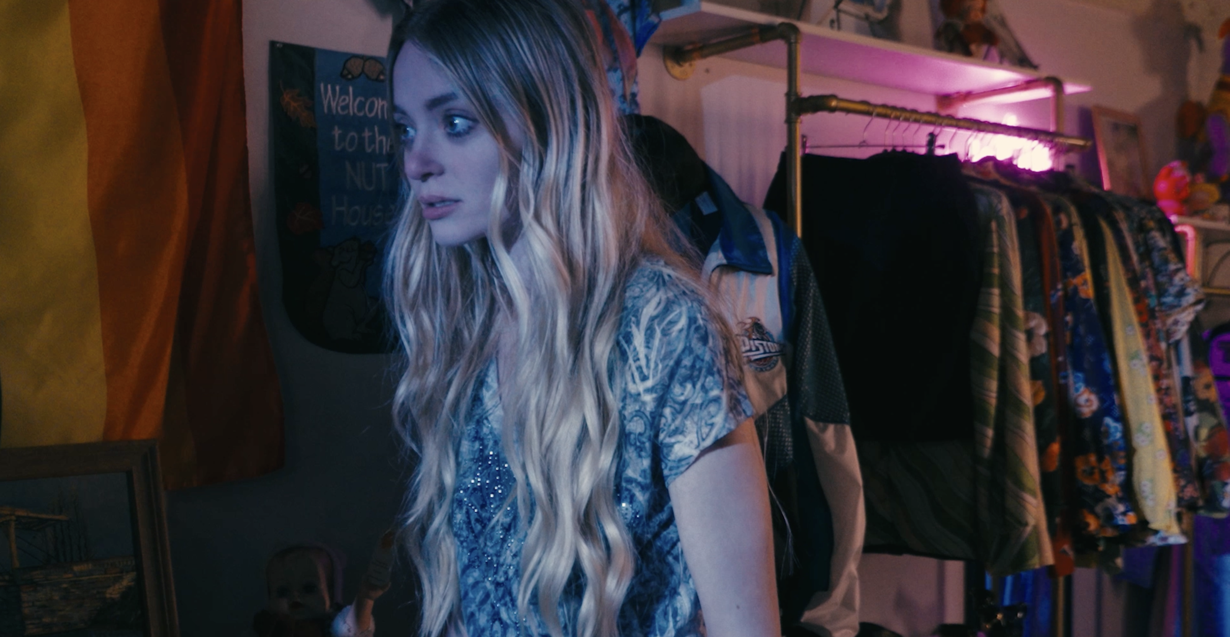 From 'Shadow.' Amber staring out the door in  the shop.