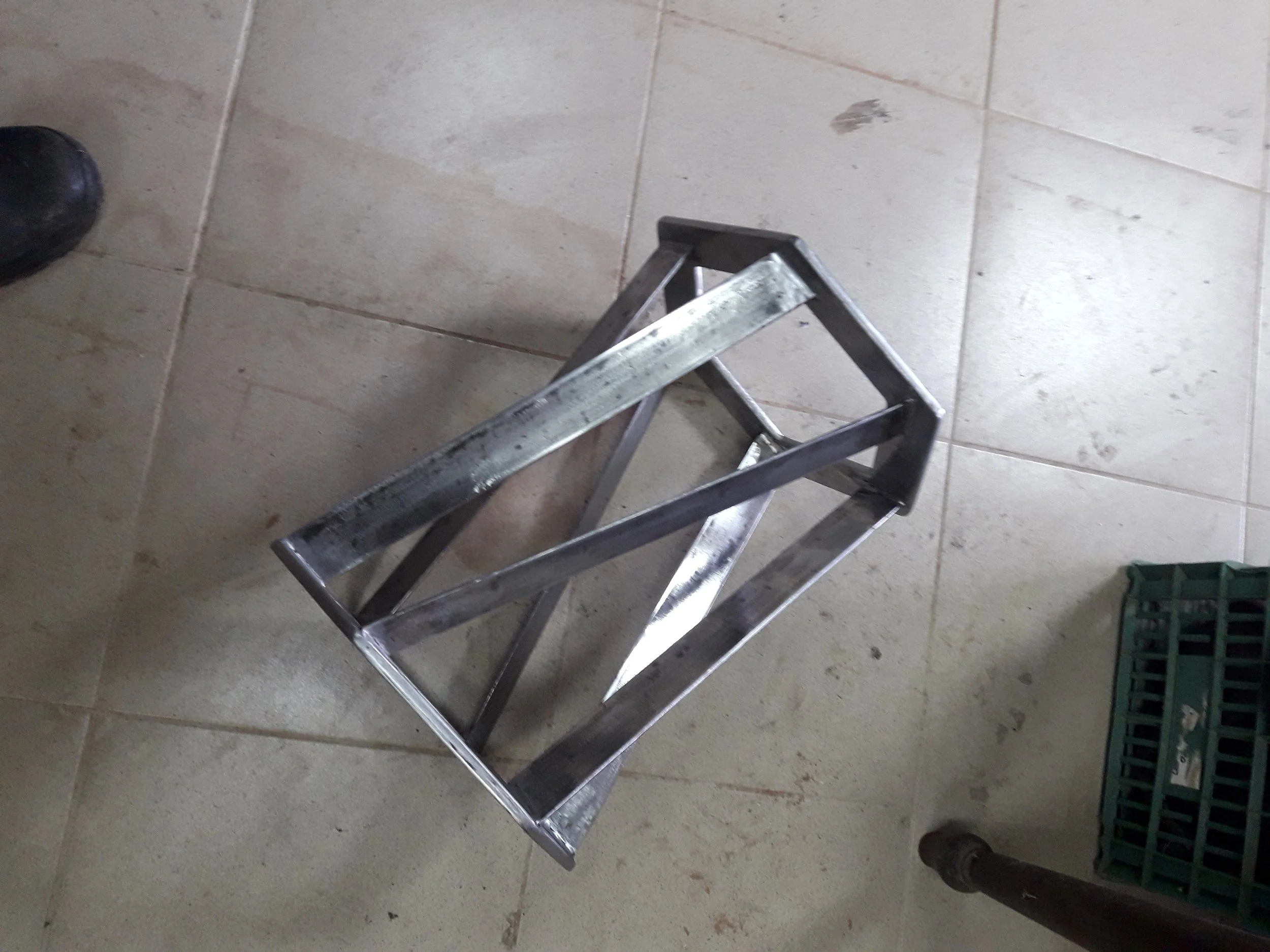 Metal frame placed on tiled floor
