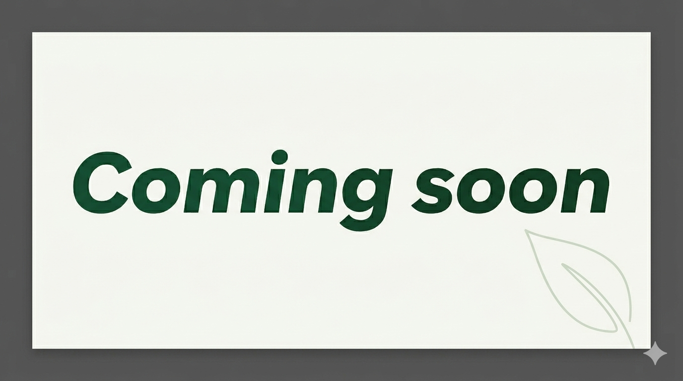 A sign with the words "Coming soon" in large dark green text and a light green leaf design in the bottom right corner.