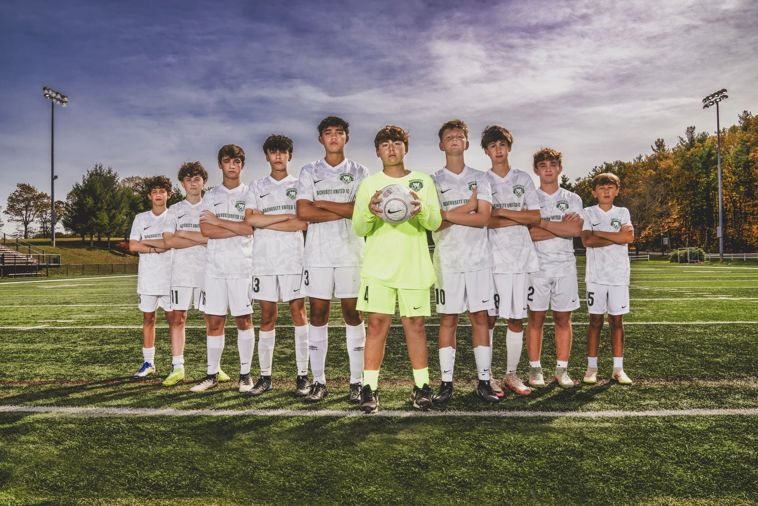 Boys soccer team photo by Fuel Media House on a turf field day game
