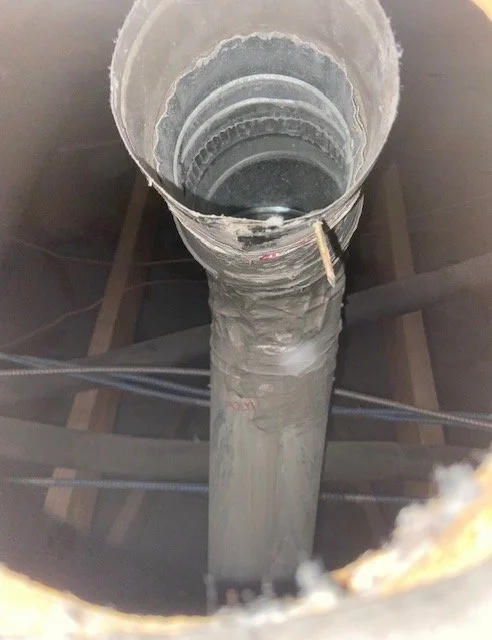 Broken Dryer Ducting that was not connected to roof wood decking, disconnecting when customer had new roof installed-Roofers don't go inside attics