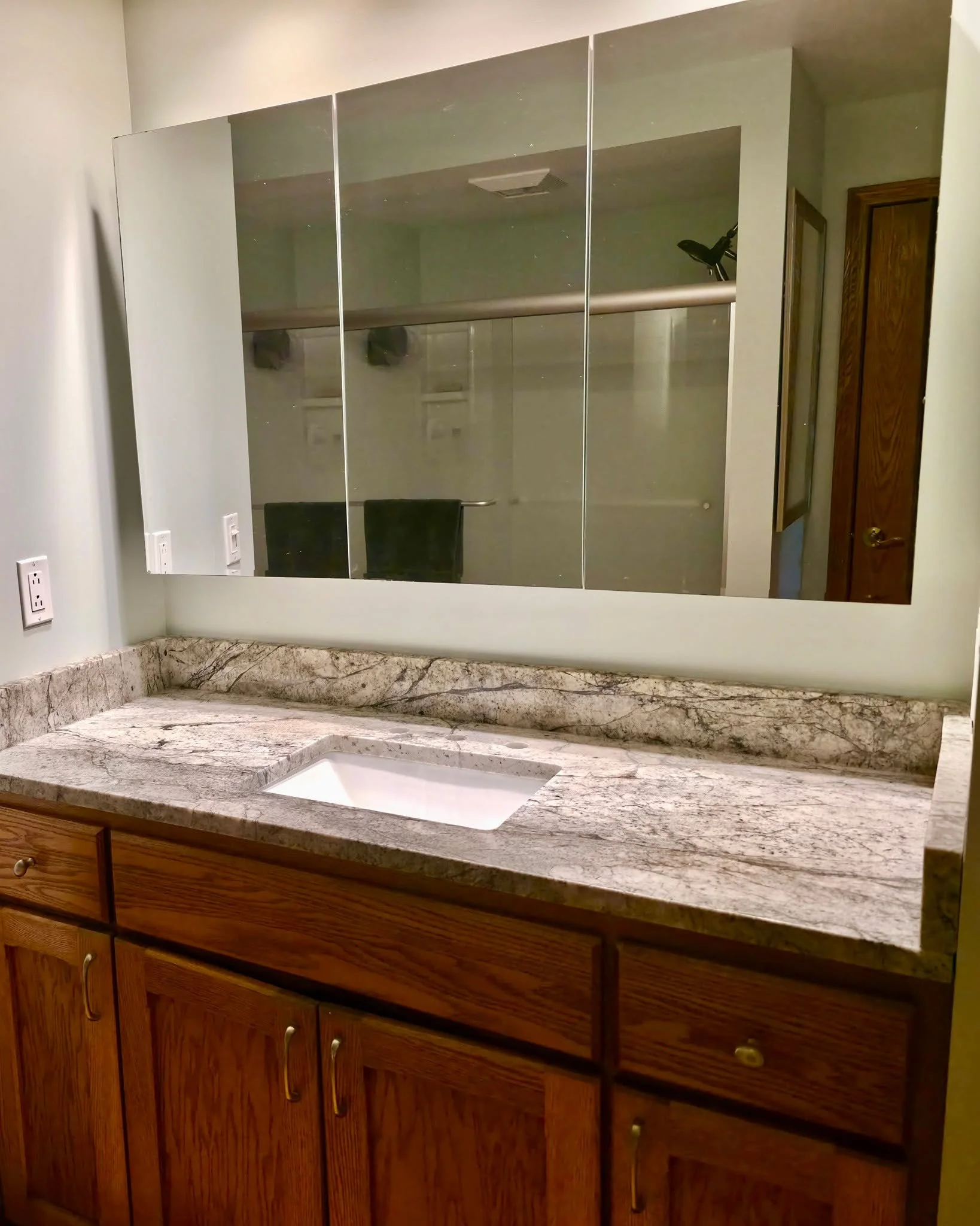 A simple upgrade that makes a beautiful difference! Sometimes small projects like this one can completely change how a bathroom looks and feels!

We often hear customers ask if they can keep their cabinets when they update their countertop and the an
