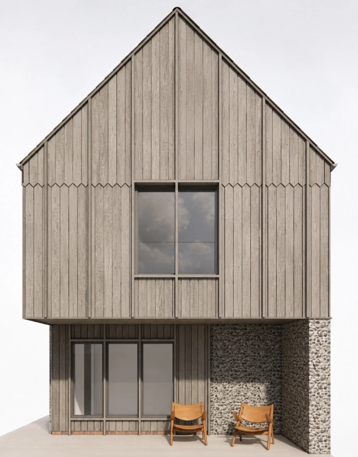 Contemporary two storey house with wooden and flint facade, large windows, two chairs outside, under a clear sky.