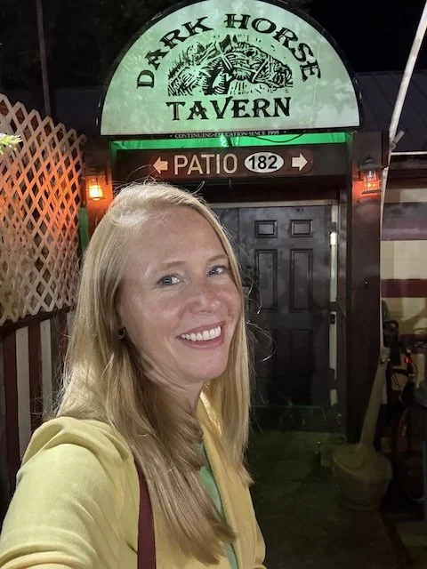 Darley outside the legendary Dark Horse Tavern in Starkville—where live music, local flavor, and good stories always meet.