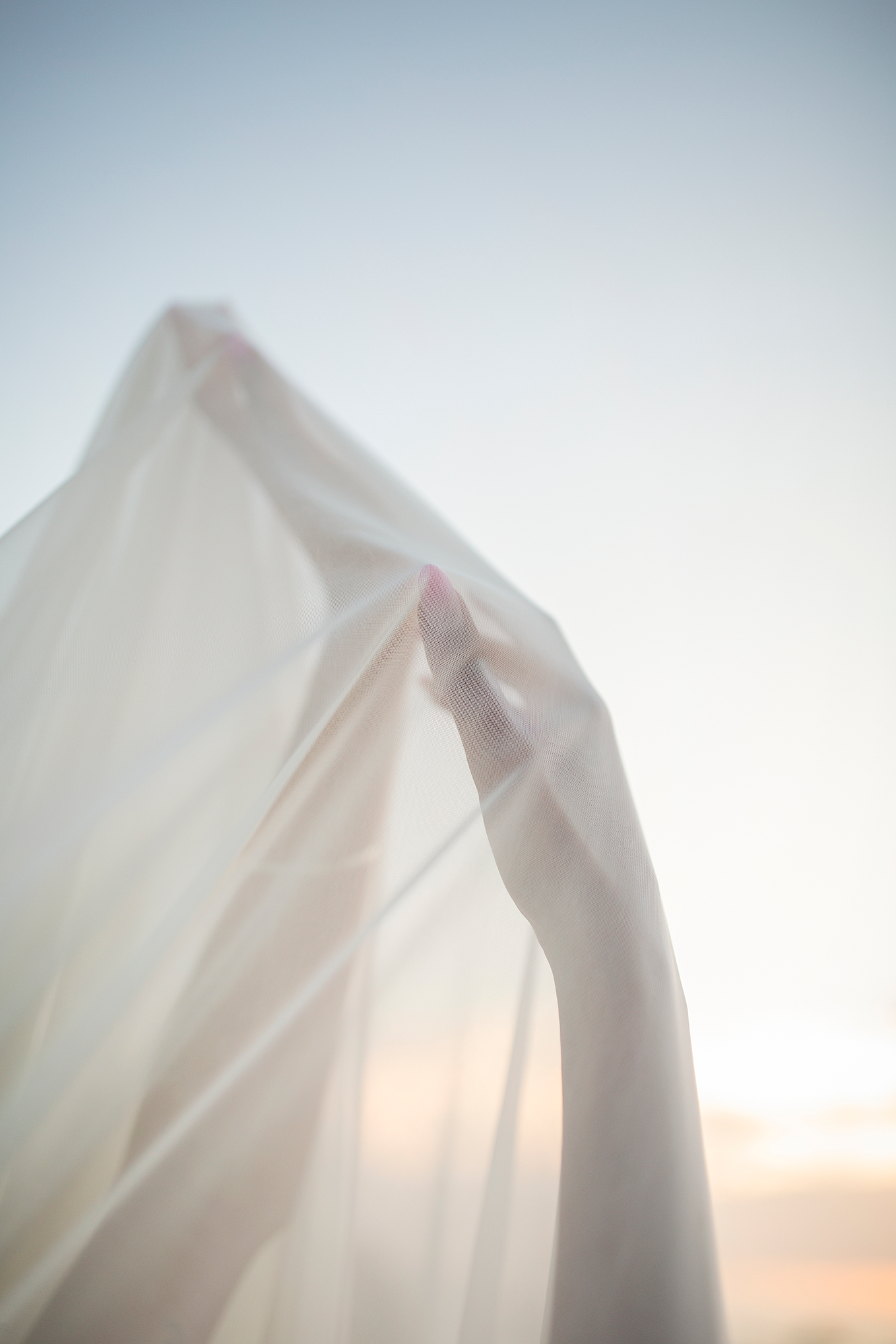 Gentle light through translucent fabric, symbolising the process of psychotherapy and emotional healing with Chantal Esperanza, Registered Clinical Counsellor in Vancouver BC.