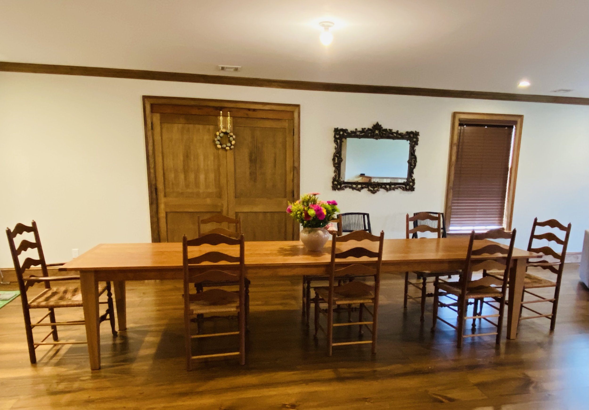 Handmade 16-foot cherry dining table crafted on Long Island for a custom Hamptons home