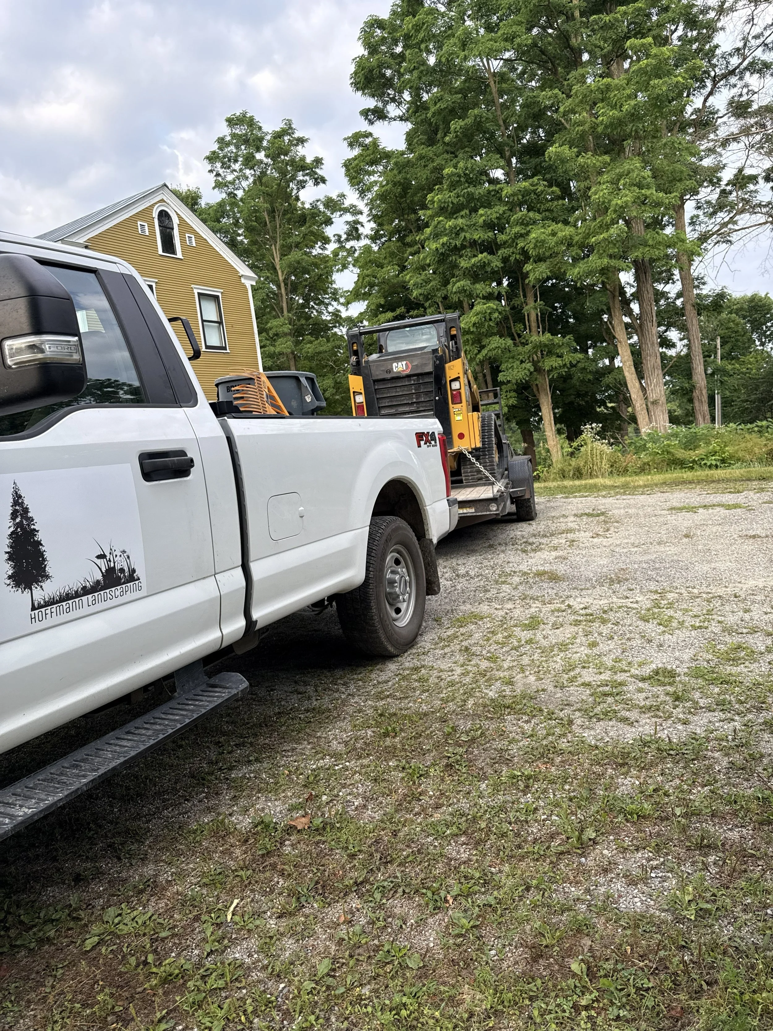 Hoffmann Landscaping_Hoffman Landscaping_Truck and Skidsteer.jpg