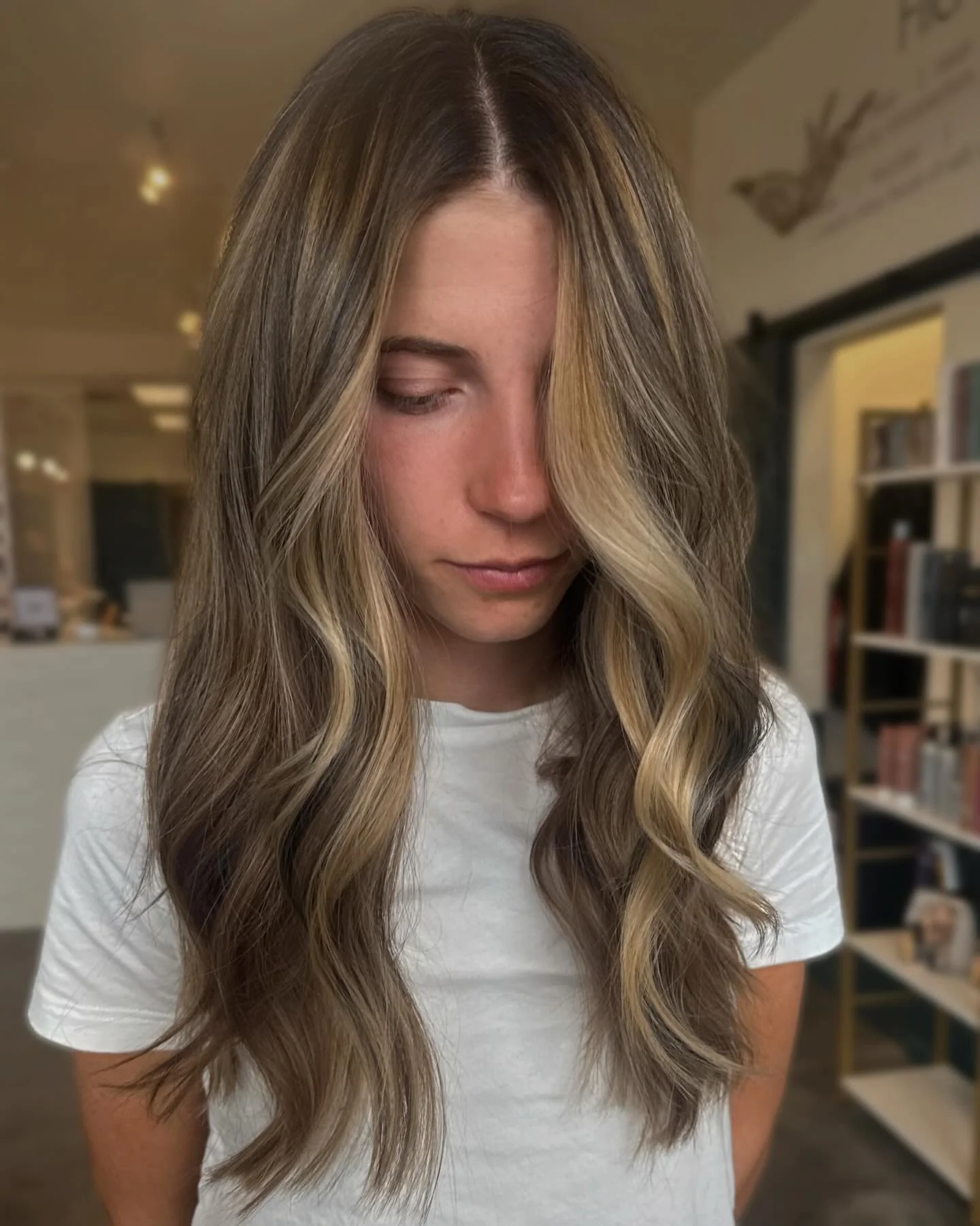 This color service is fully custom to each person. While I have my signature techniques, every hairline, texture, and lifestyle plays a role in how color is applied.

For her, the goal was to keep brightness around the face while creating a balanced 