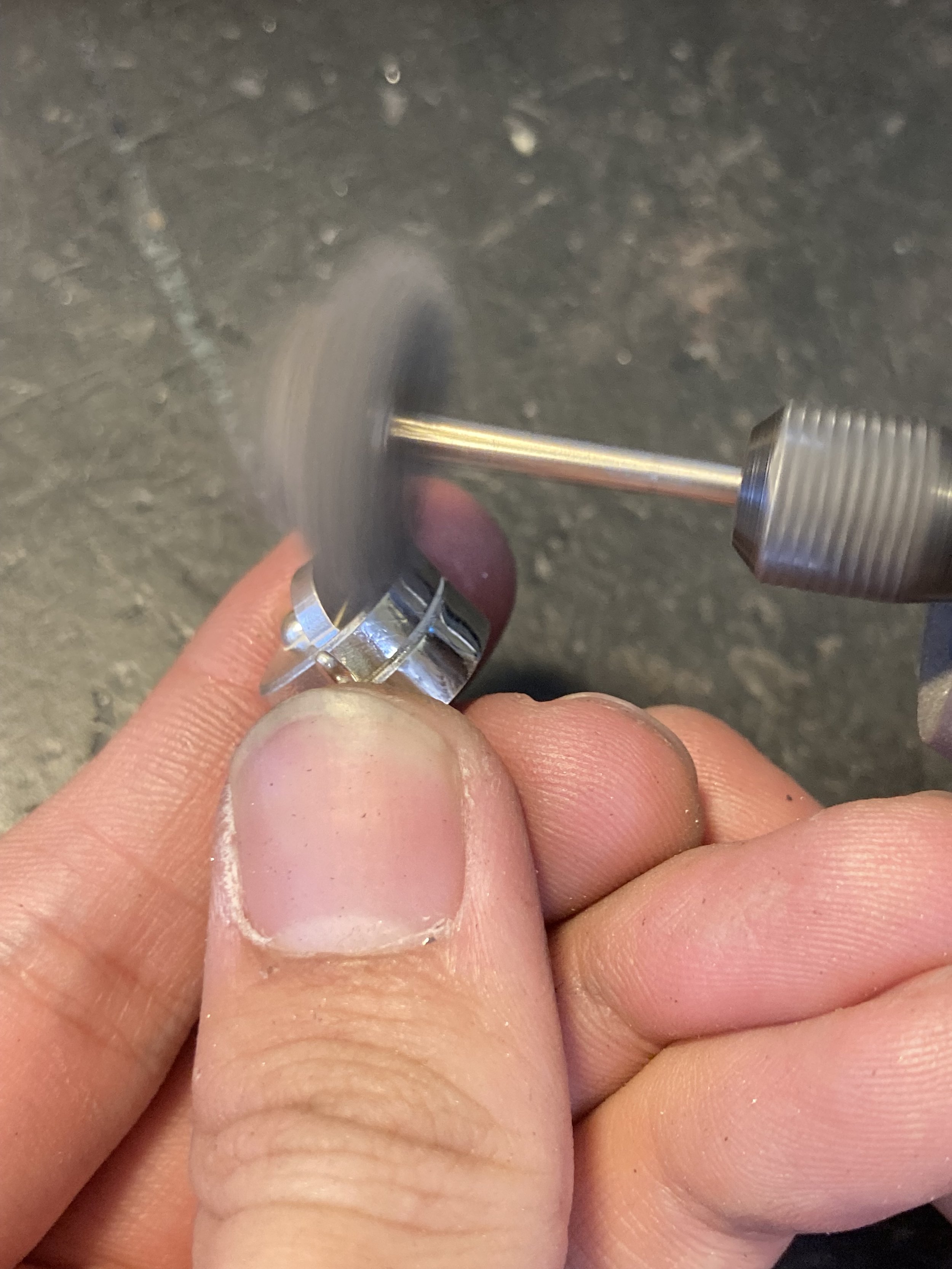Polishing is the final step in the jewelry-making process, where the piece is brought to life with its full brilliance. After casting and stone setting, each surface is carefully refined using a series of abrasive wheels, compounds, and brushes to re