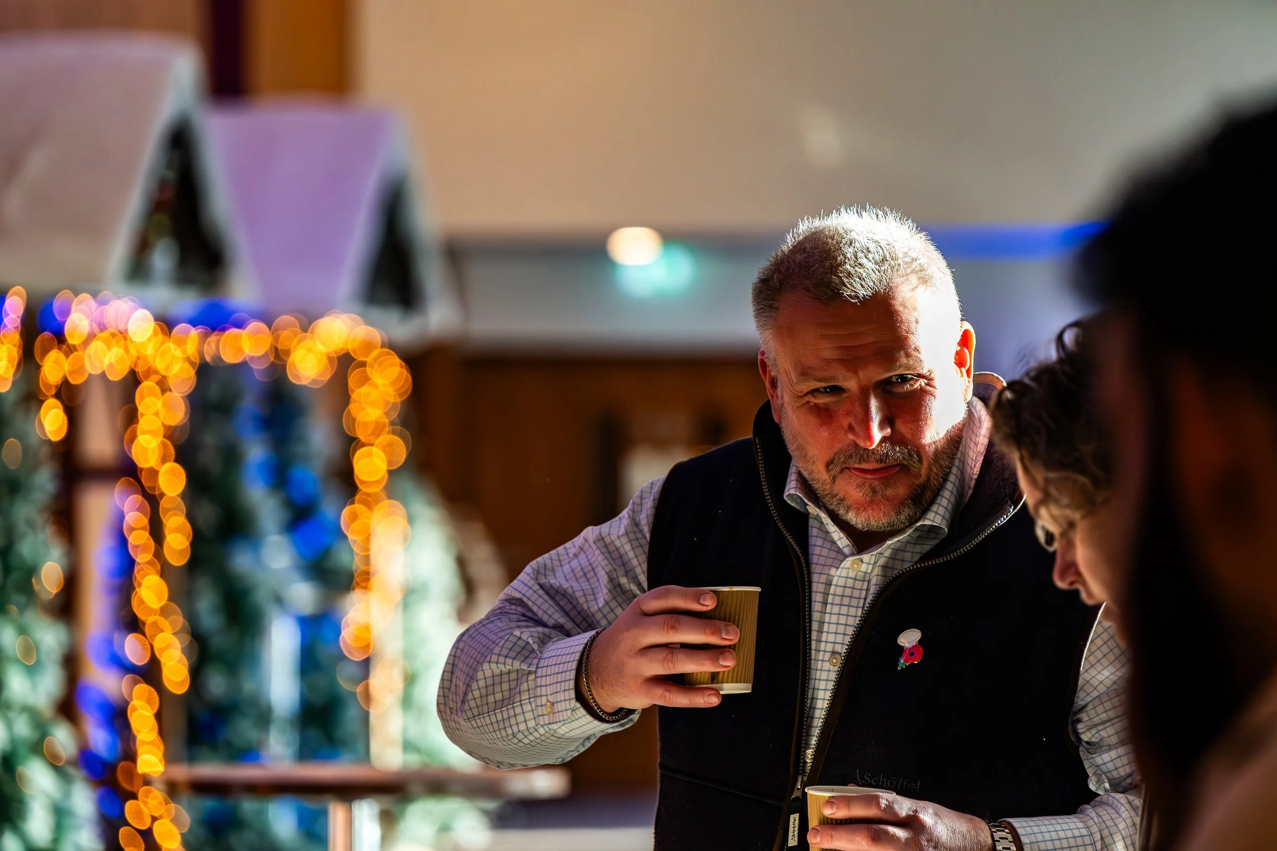 Christmas event photography capturing guests enjoying a festive celebration.