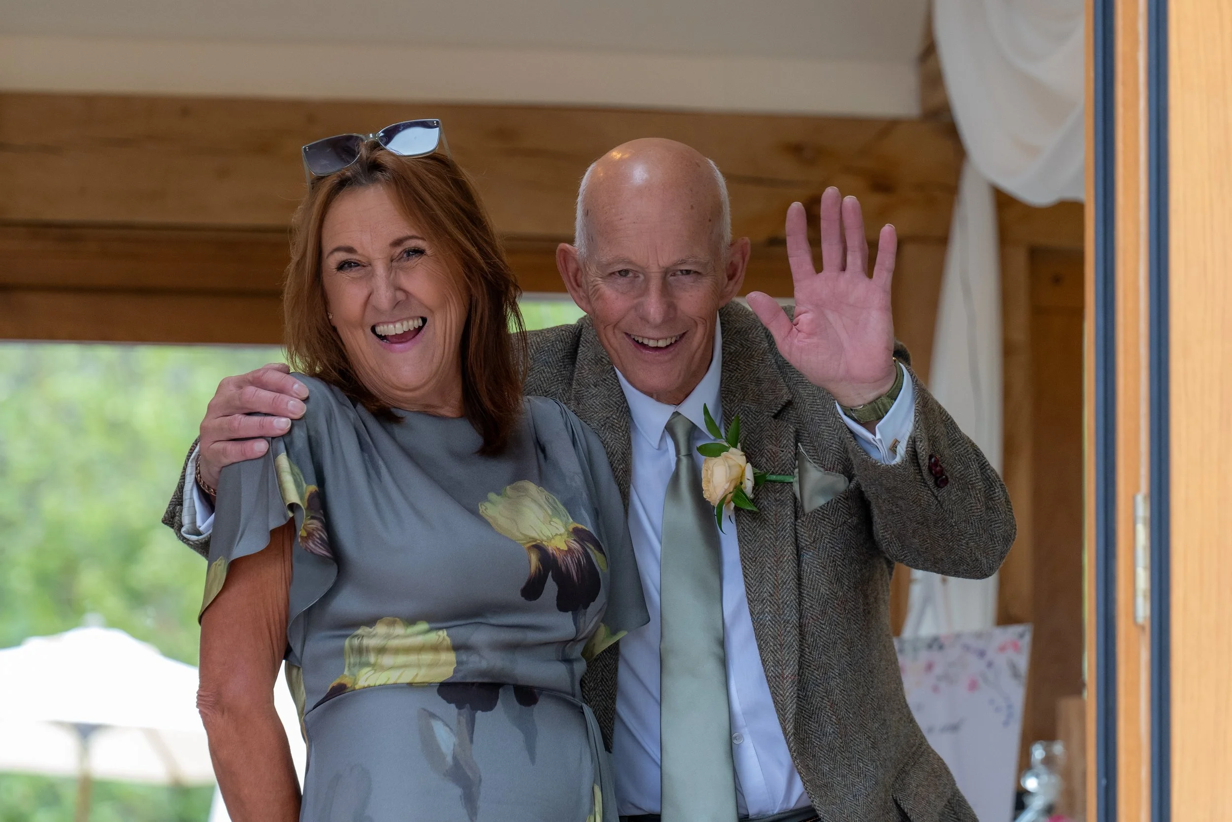 Wedding guest photography capturing an emotional reaction during the day.