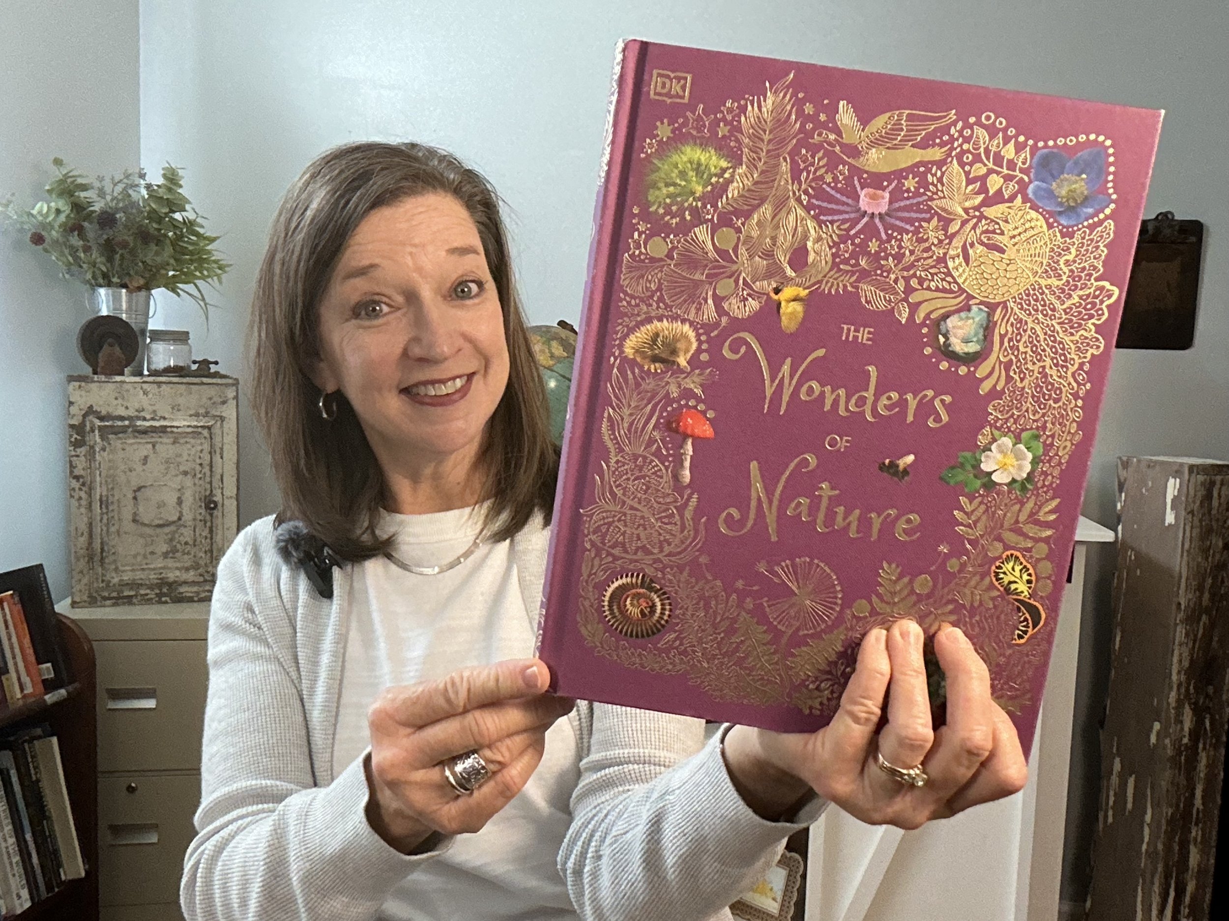 "The Wonders of Nature"  Another beautiful and engaging book by DK Publishers.  This book will delight your child with beautiful photos and interesting text about rocks, minerals, plants, and animals.  Nature is full of amazing things!  Click to view