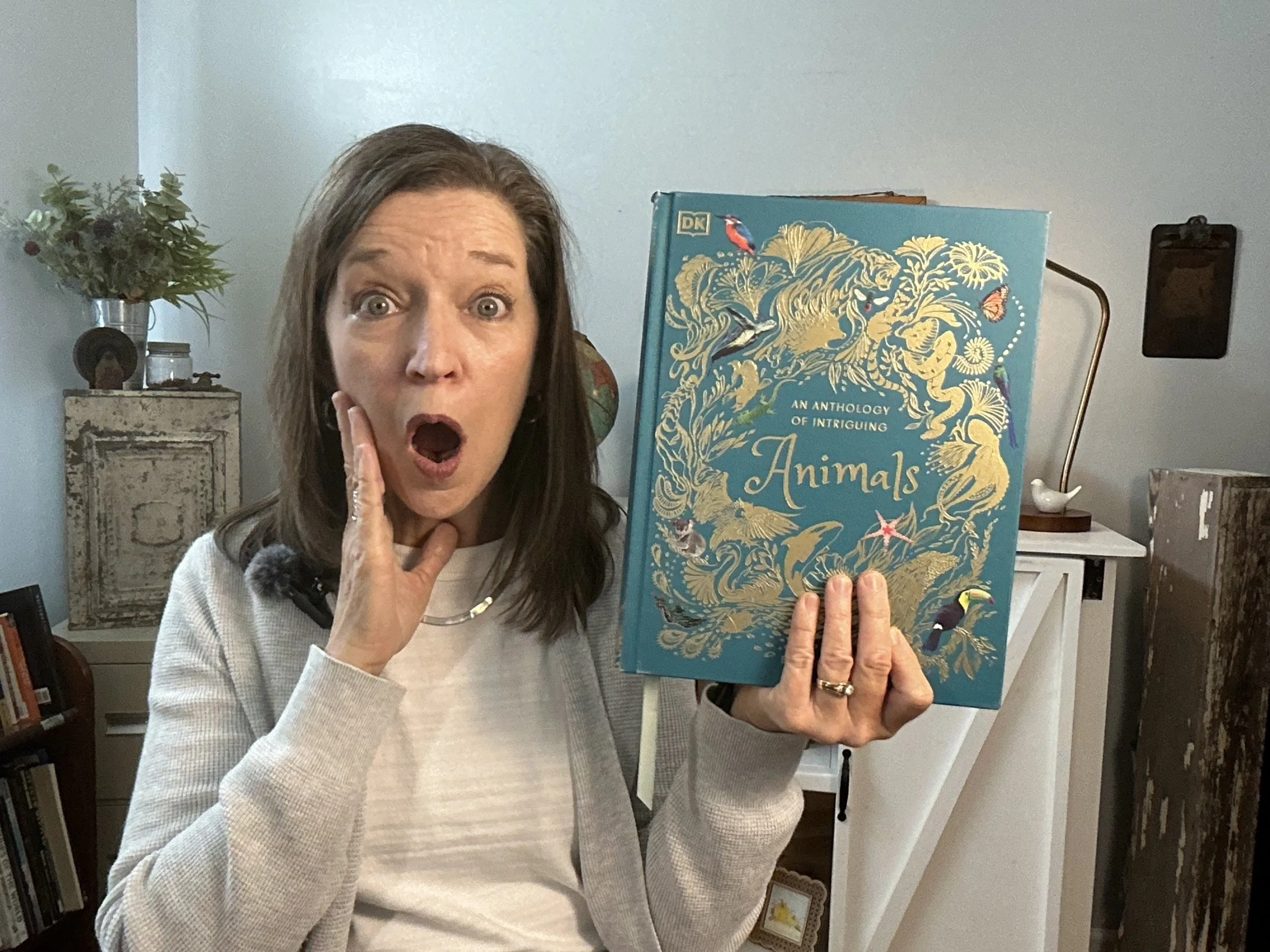 "An Anthology of Intriguing Animals". 
"Lions, and tigers, and bears!  Oh, my!"  This wonderful book is full of the amazing photos and fantastic facts about familiar animals children love and weird and wonderful animals they have probably never heard