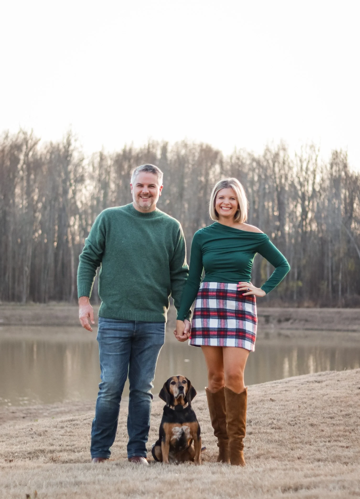 Plain skort with green off the shoulder shirt. Man with green sweater and beagle puppy