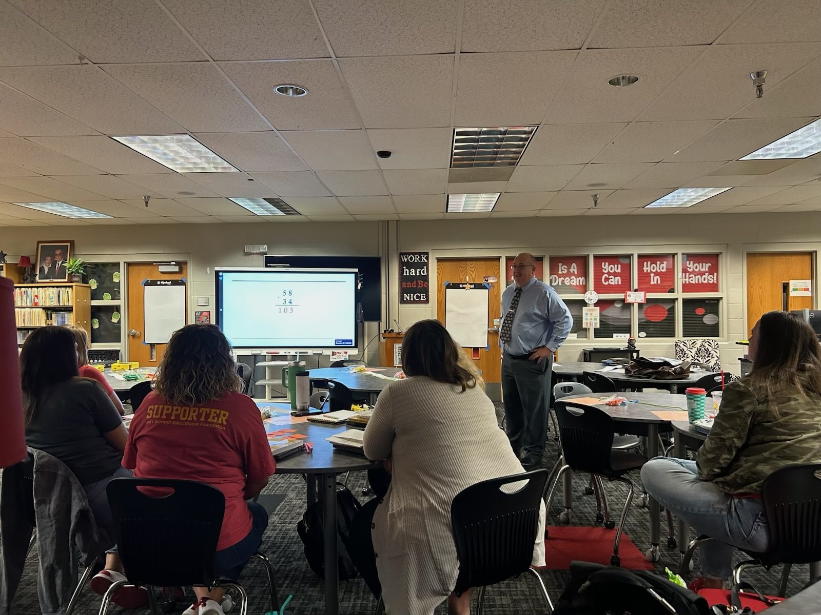 Challenging teachers to question their assumptions: How can 58 + 34 equal 103?