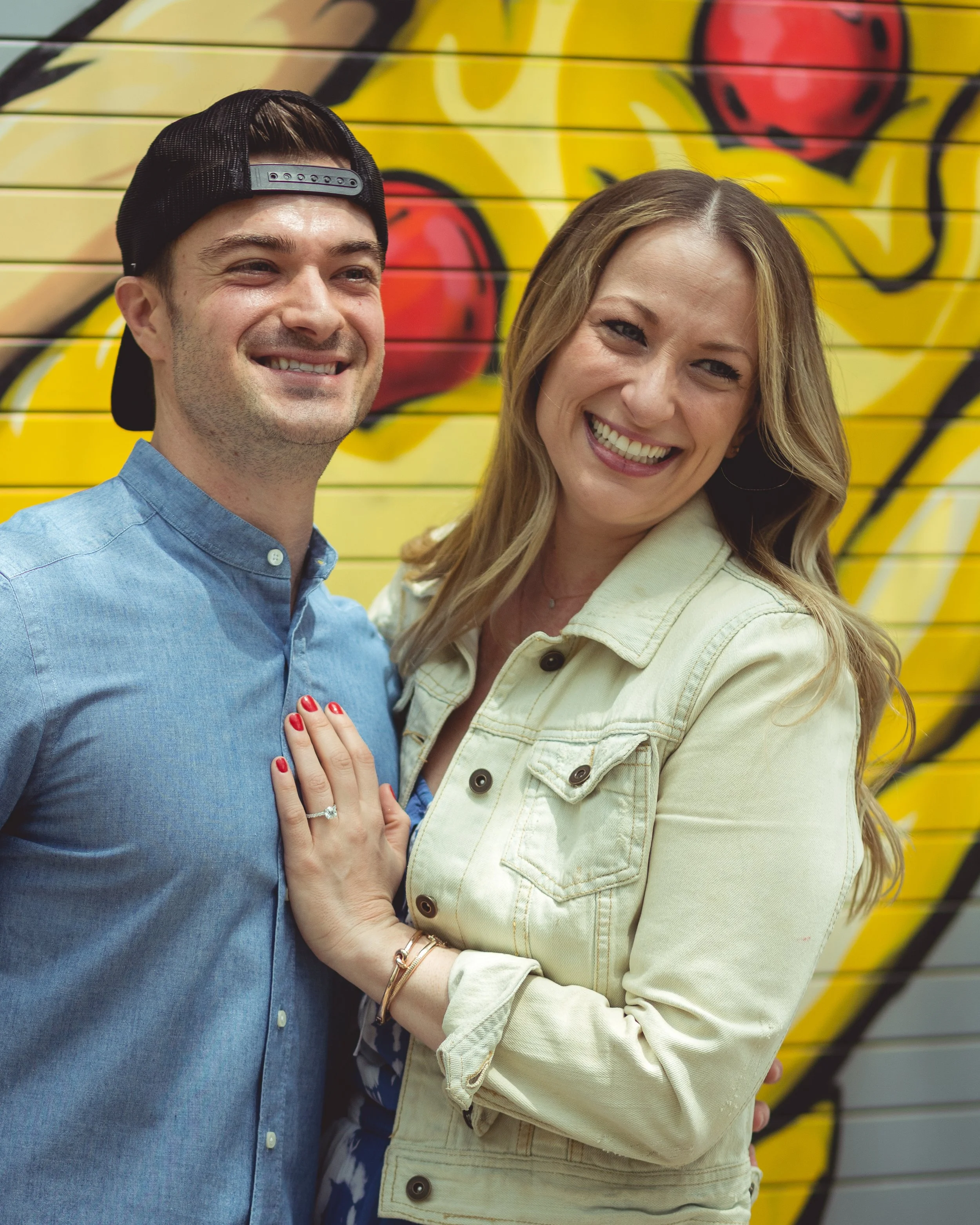 A man proposes to a woman at Parlor Pizza in West Loop Chicago, Illinois