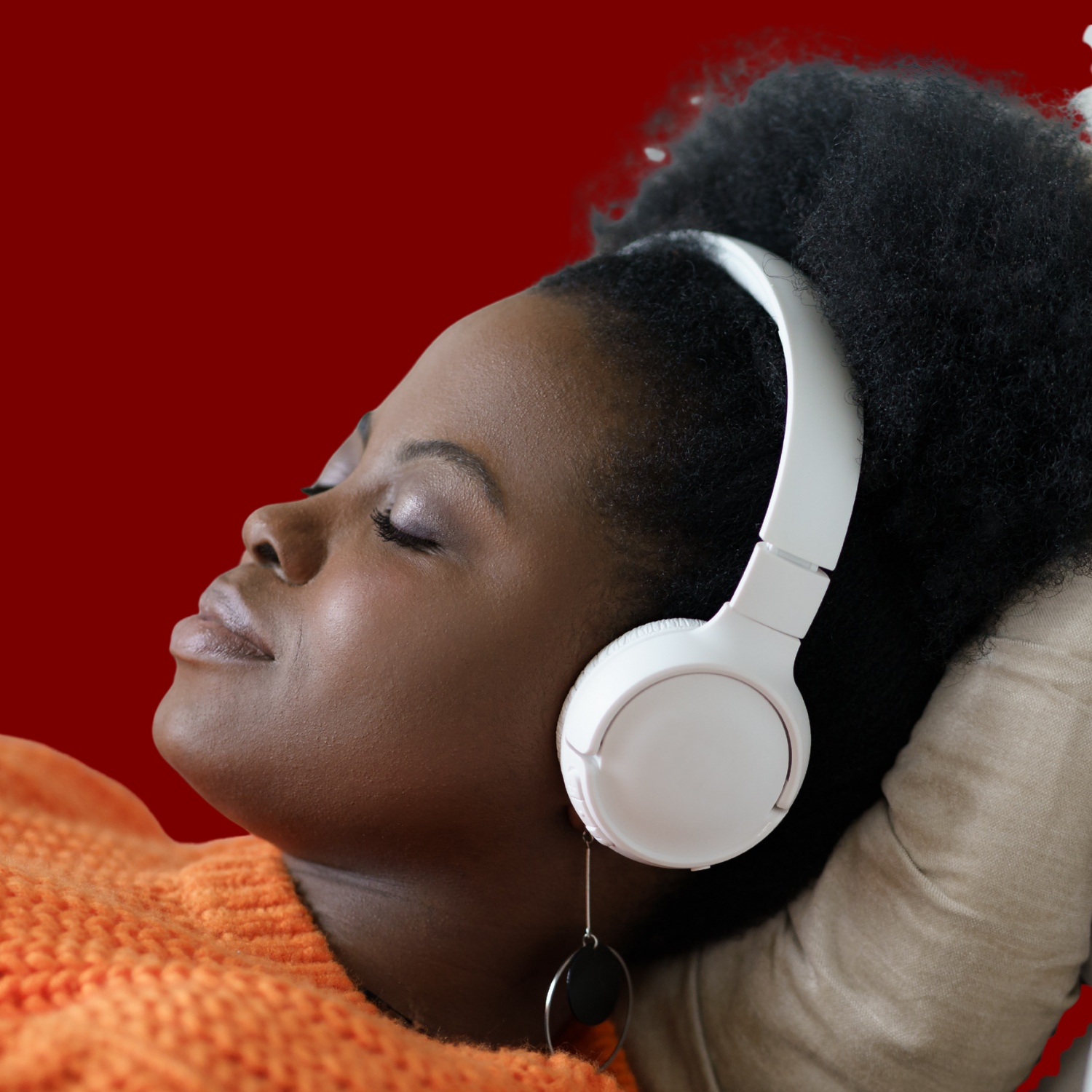 Black woman in headphones ketamine assisted psychotherapy
