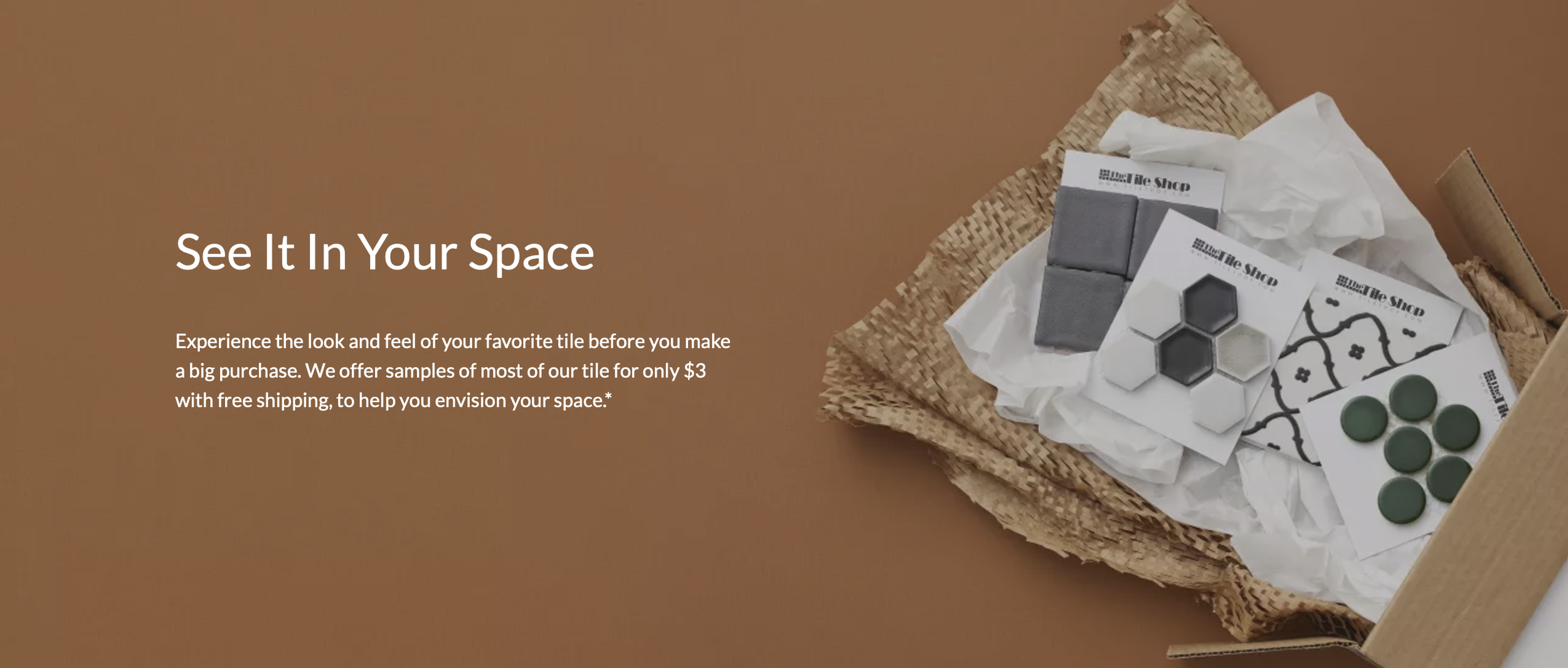 Tiles samples in a cardboard box with text "See It In Your Space" on a brown background.