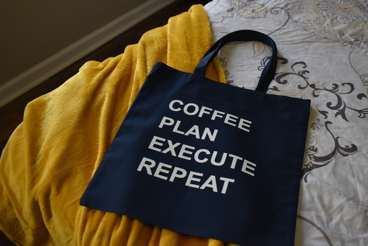 “Coffee. Plan. Execute. Repeat.” — Tote Bag