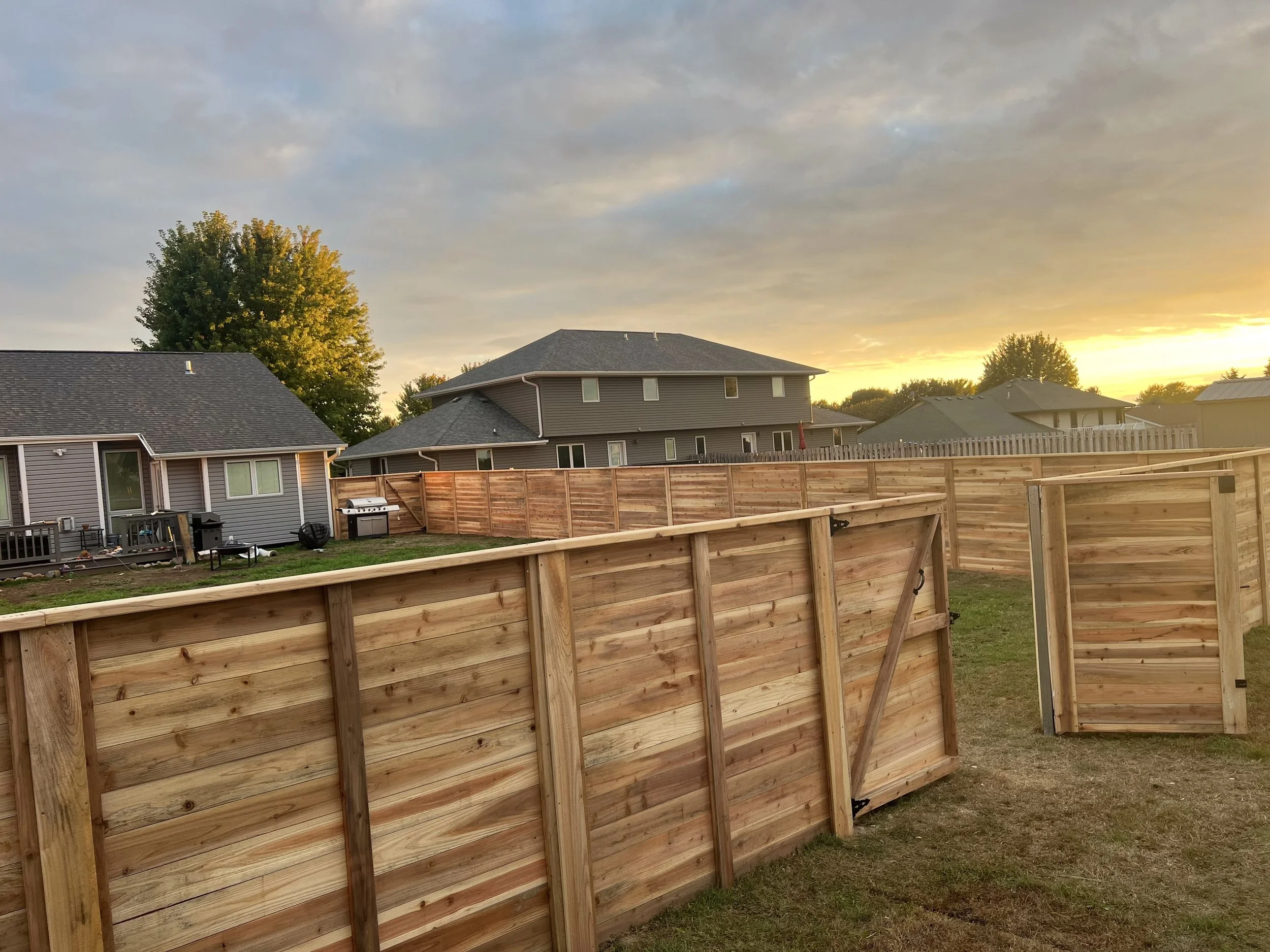 Wood fence installation in Sioux Falls by AJ&D Contracting