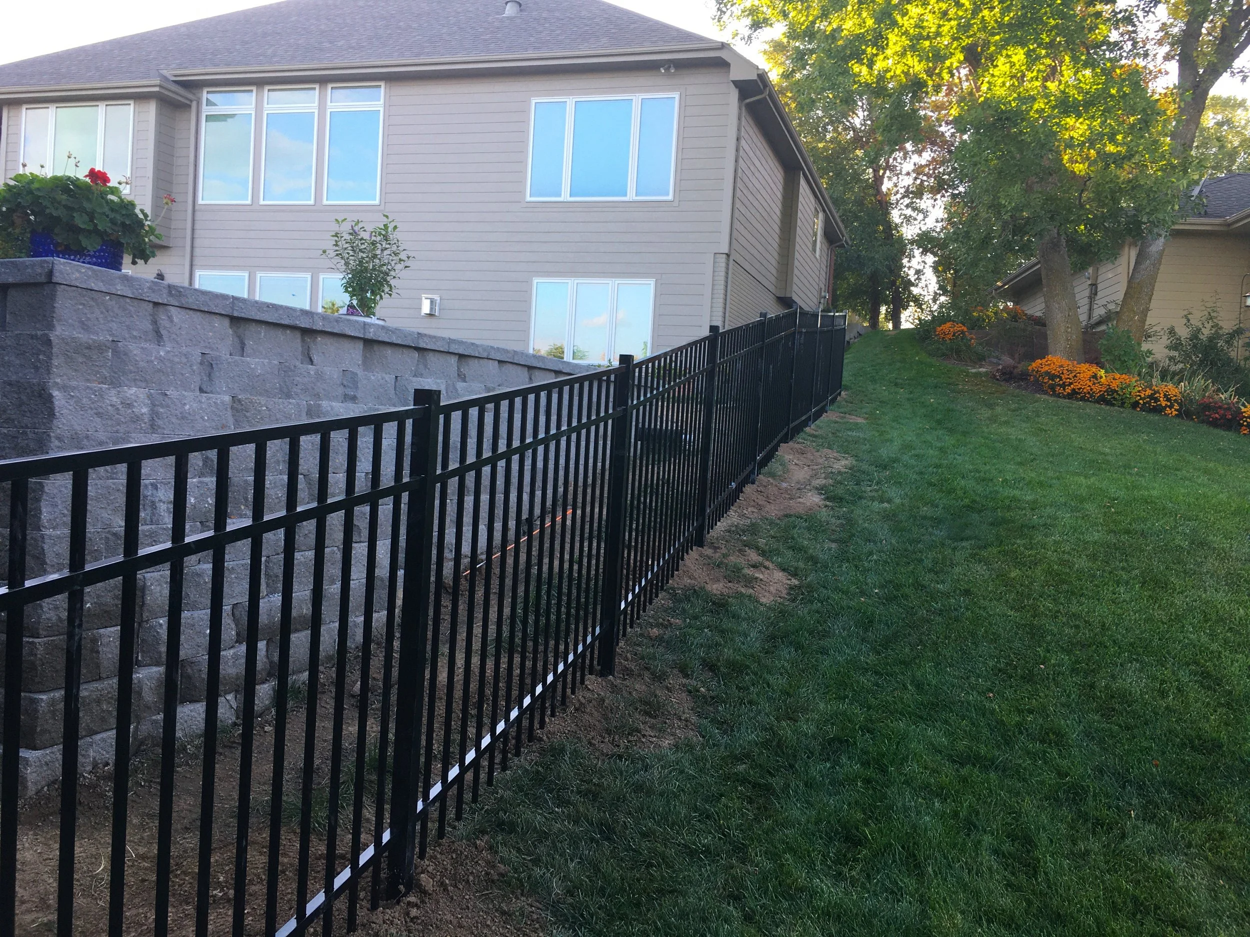 Aluminum fence installed along property line in Sioux Falls South Dakota
