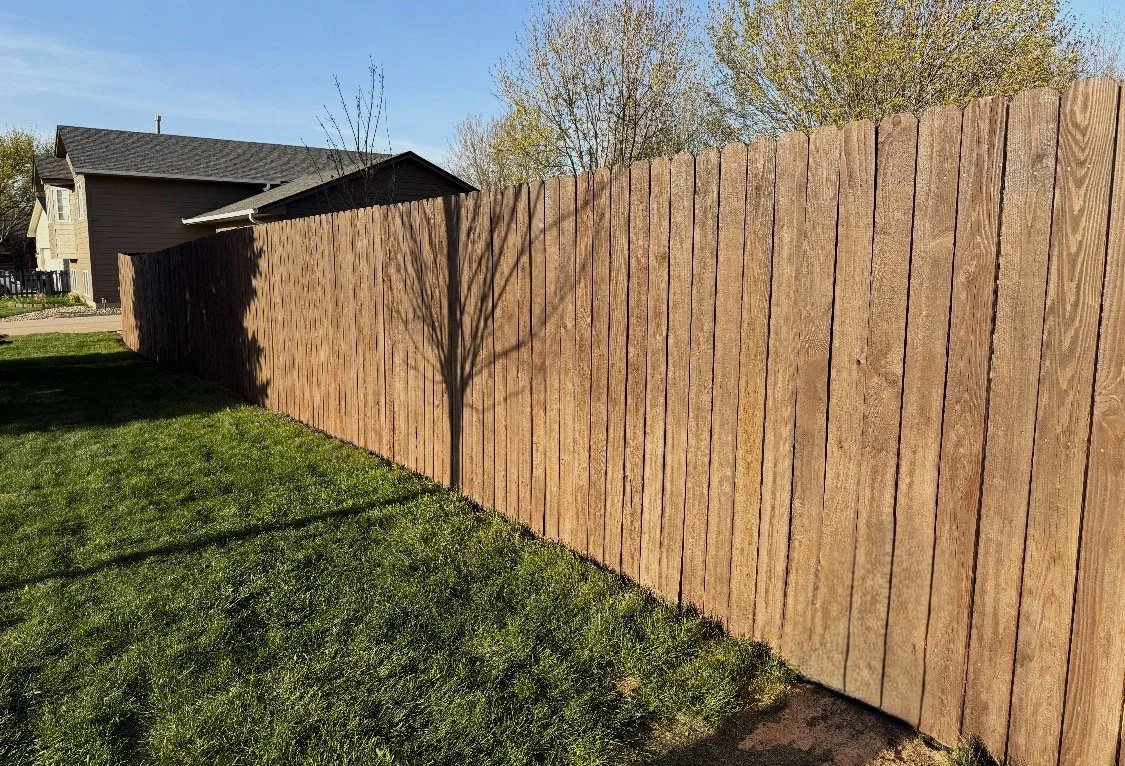 Wood privacy fence painting Sioux Falls