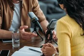 a person sharing their story on talking blind podcast