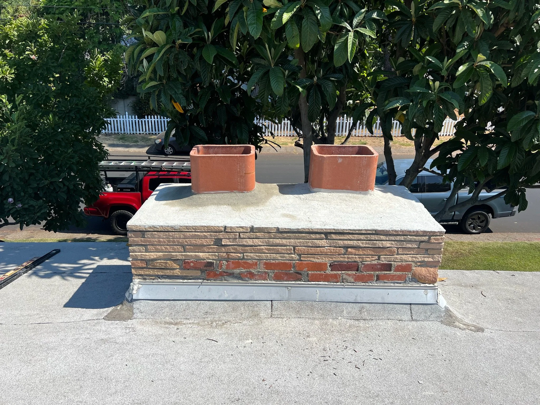 Clay tiles to extend the flue