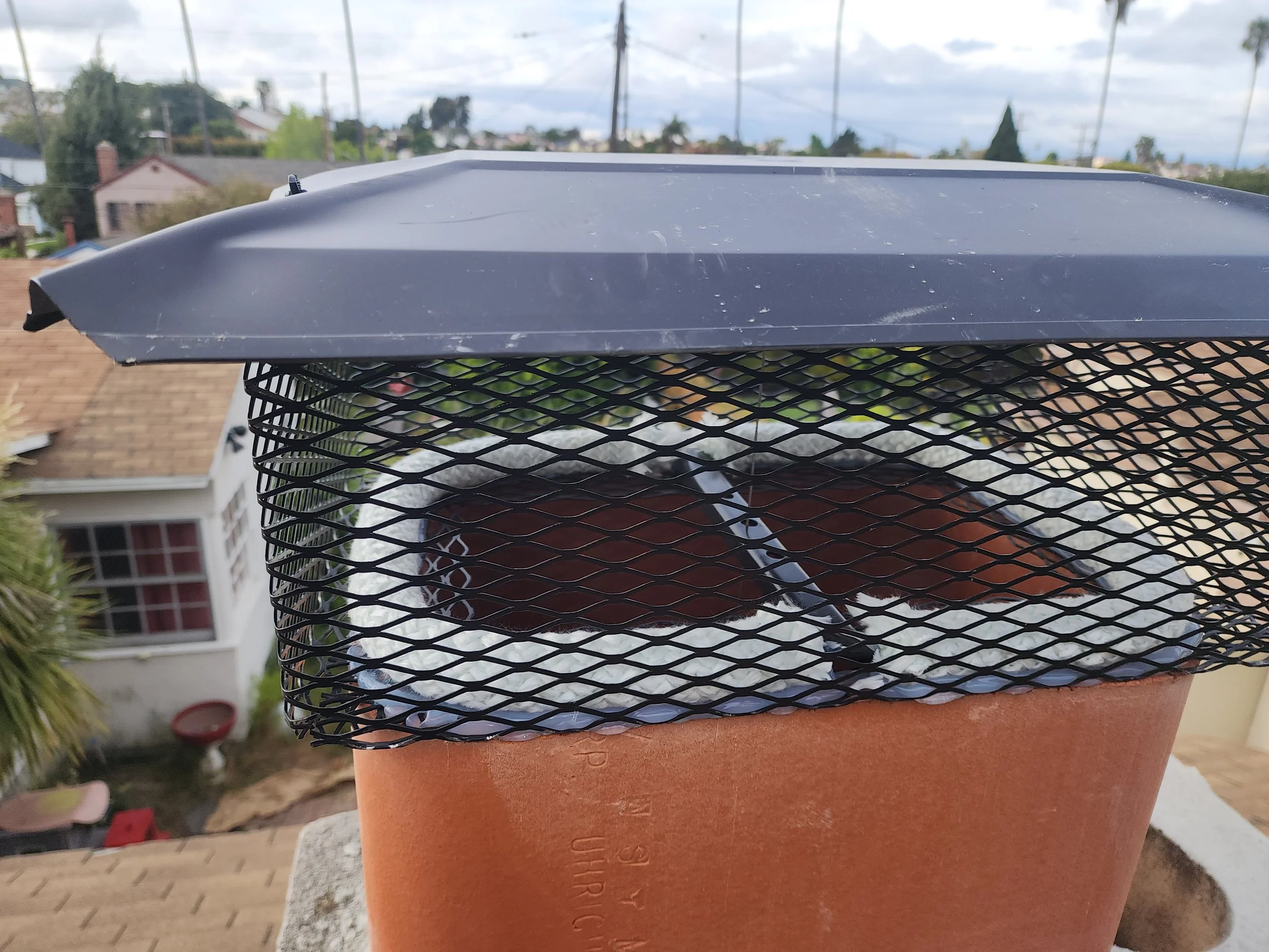 Clay tile to extend the height of the flue