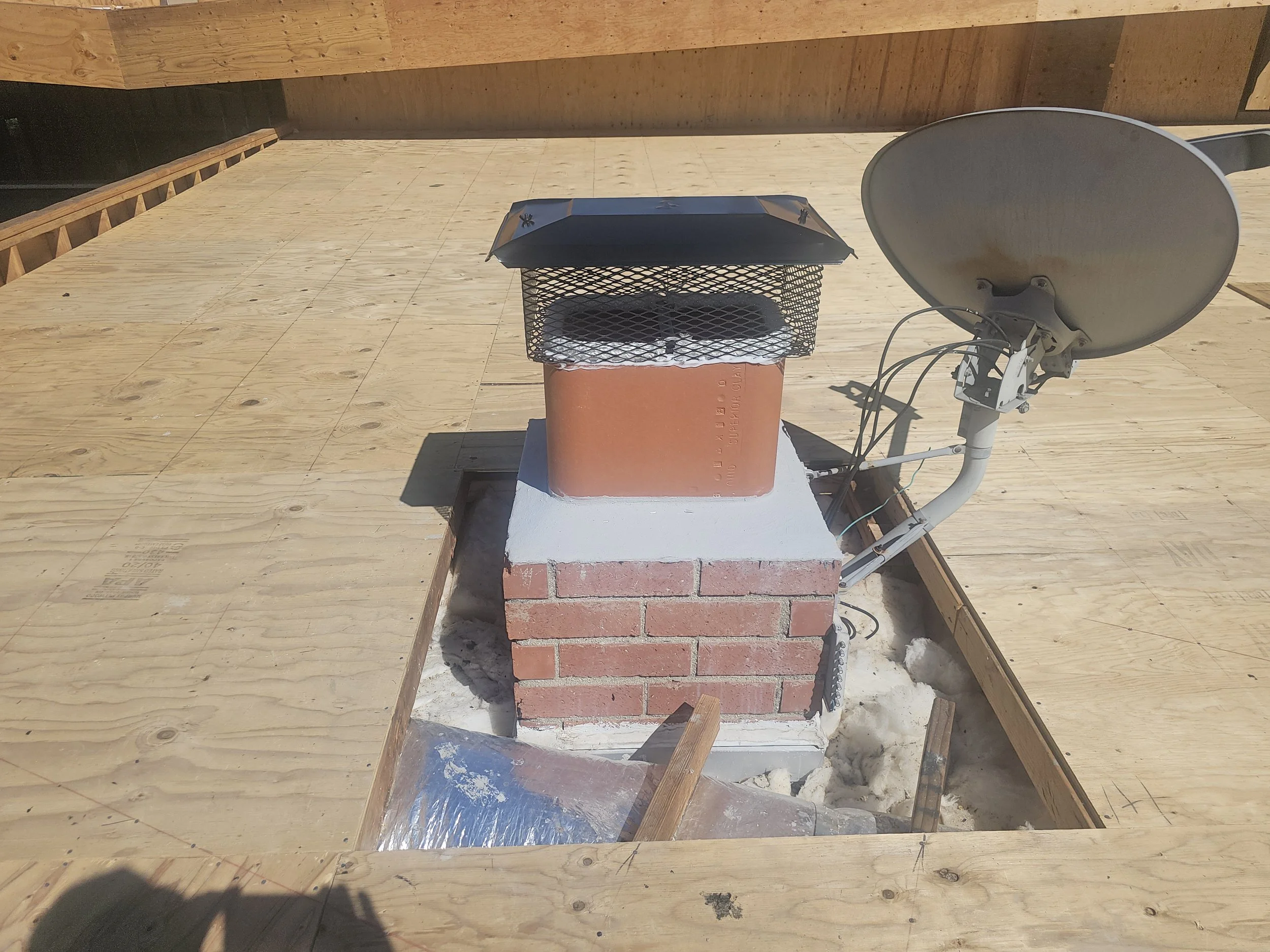 Clay tile to extend the height of the flue