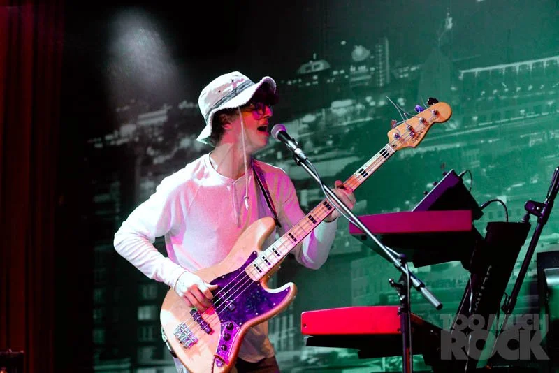 Abe Playing Bass & Singing.JPG