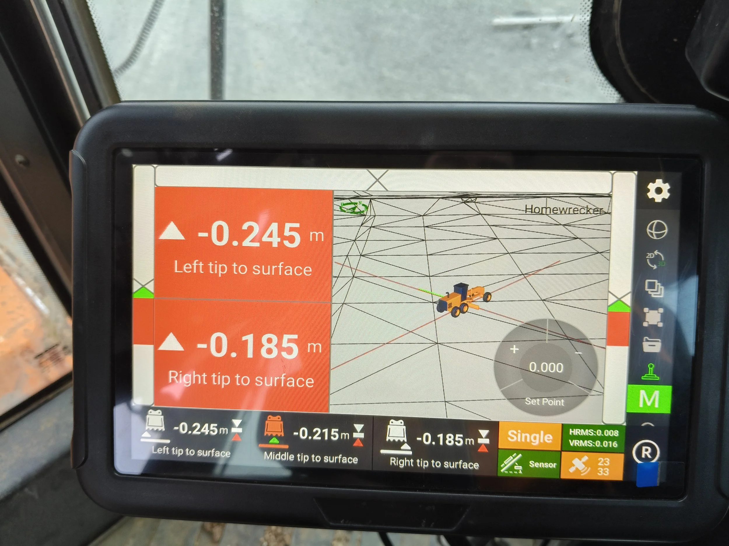 Guidemate G-Track 3D Grader Control System display showing real-time blade elevation and grade information