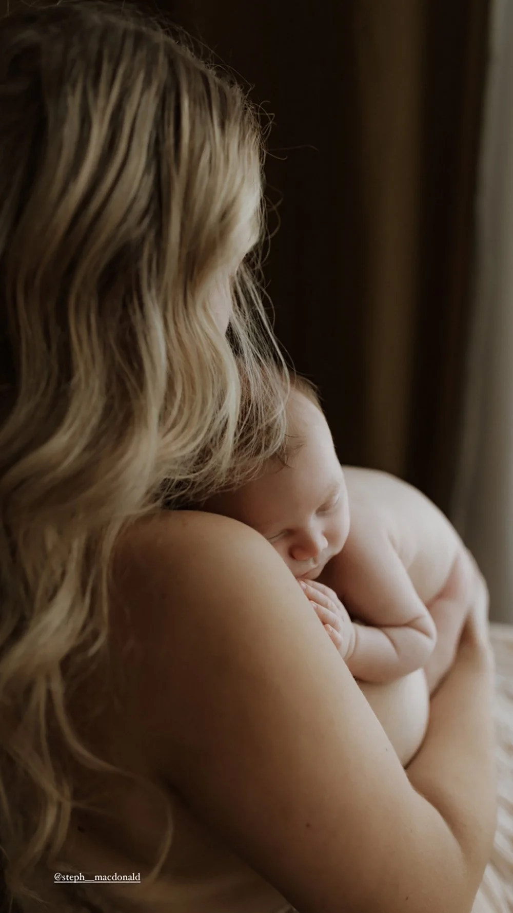 Close up image of mother and newborn baby, skin-to-skin