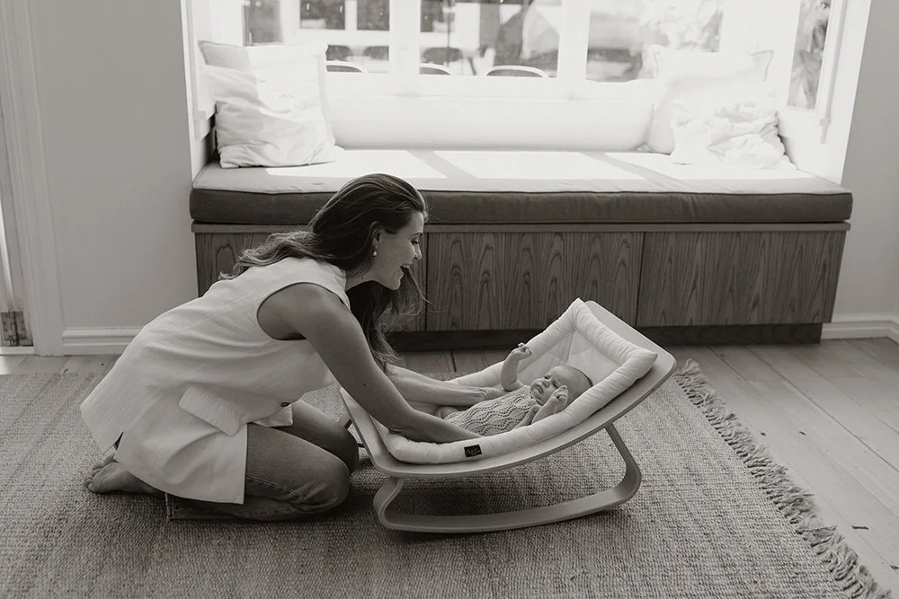 Mother and baby interacting. Image captured In home at six weeks old in Auckland, New Zealandkland Newborn Photographer