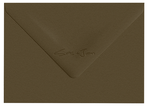 Close-up of a brown paper envelope with handwritten text that reads 'Lex x Jen' in the corner.
