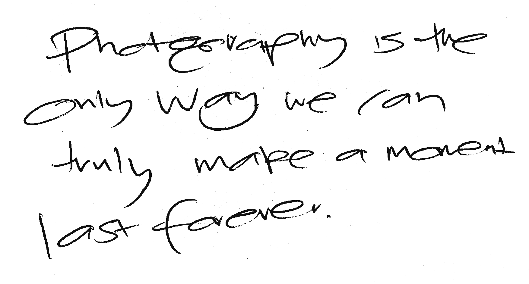 Handwritten note stating, 'Photography is the only way we can truly make a moment last forever.'