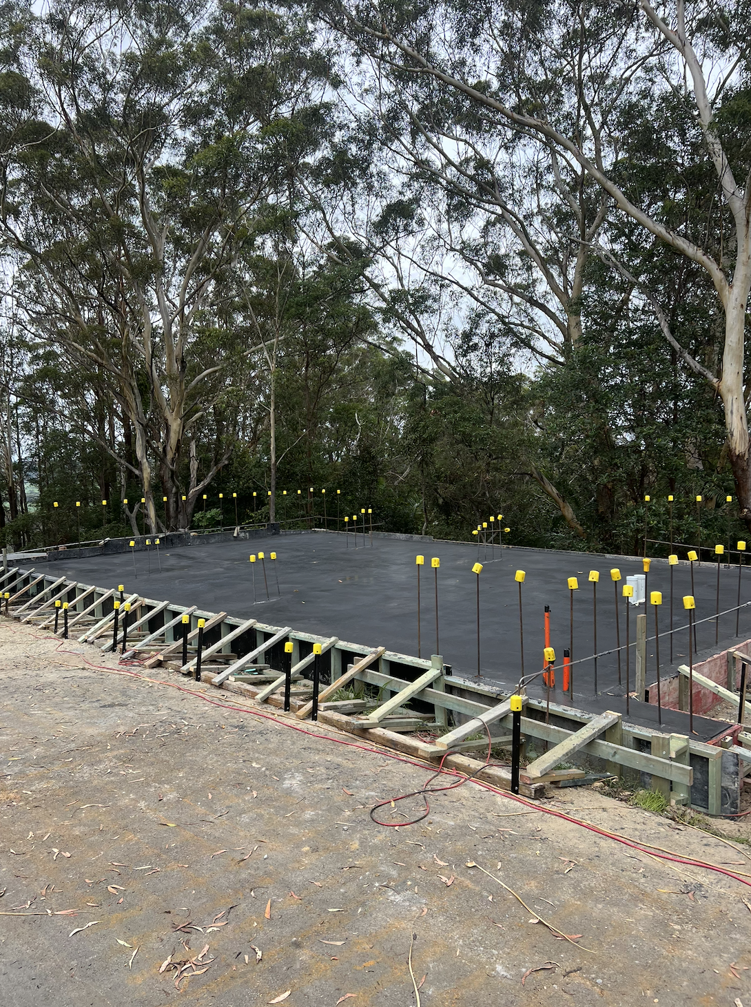 Concrete site with freshly poured and flattened residential concrete slab Currumbin Gold Coast QLD