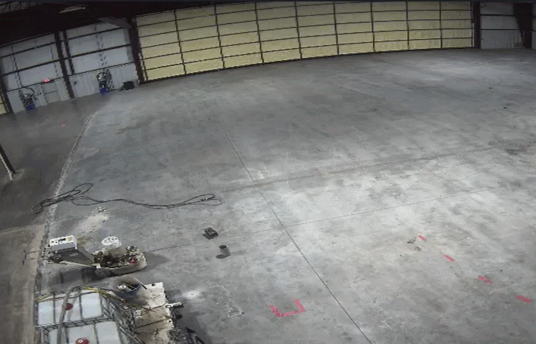 airport hanger floor concrete before