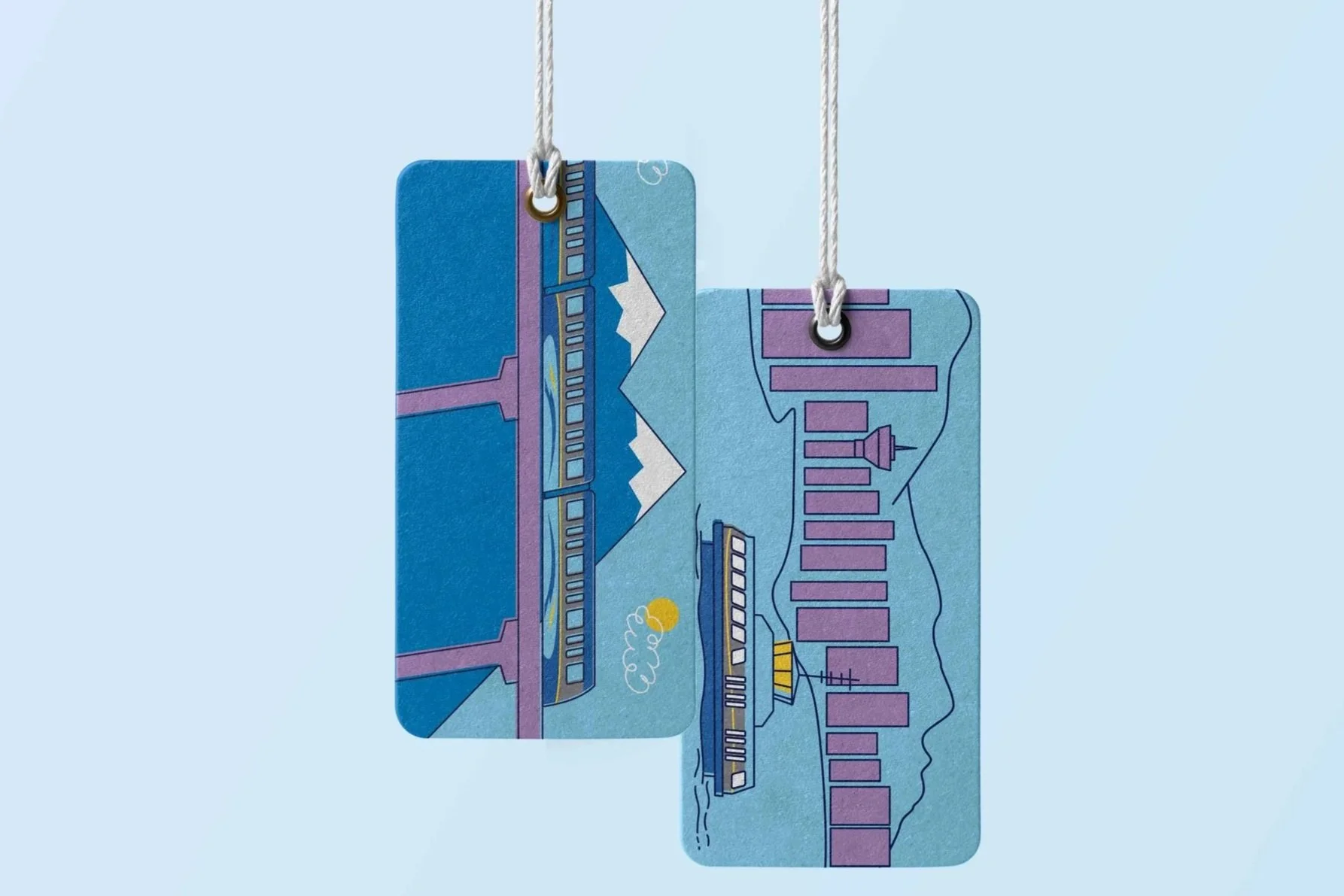 Two train tickets hanging from strings against a light blue background. The tickets have illustrations of trains, tracks, and a station.