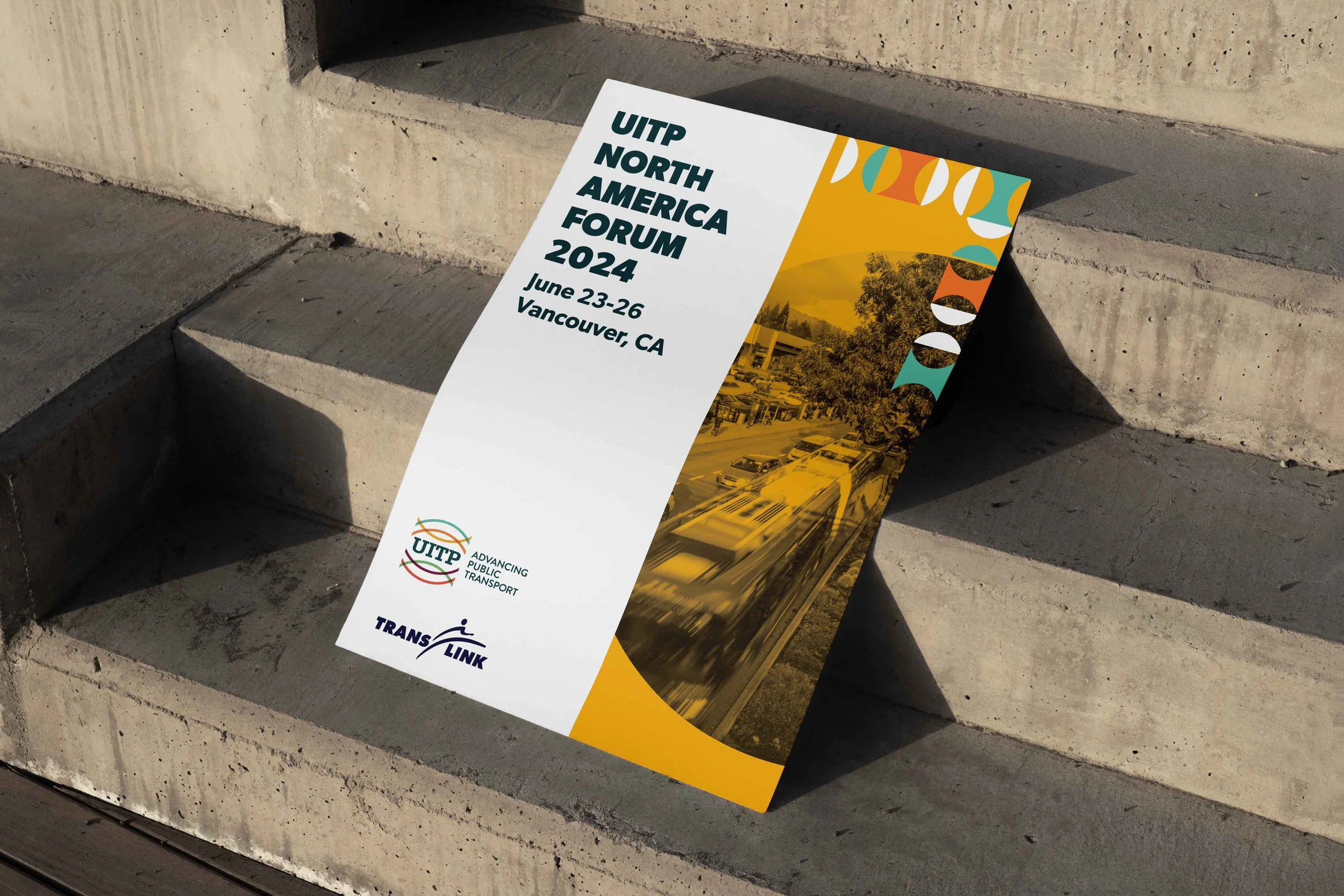 Poster for the UITP North America Forum 2024, held June 23-26 in Vancouver, CA, featuring the UITP and TransLink logos, with a yellow truck and city skyline in the background.