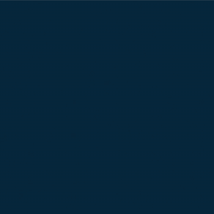 A dark blue gradient background with no distinct objects or features.